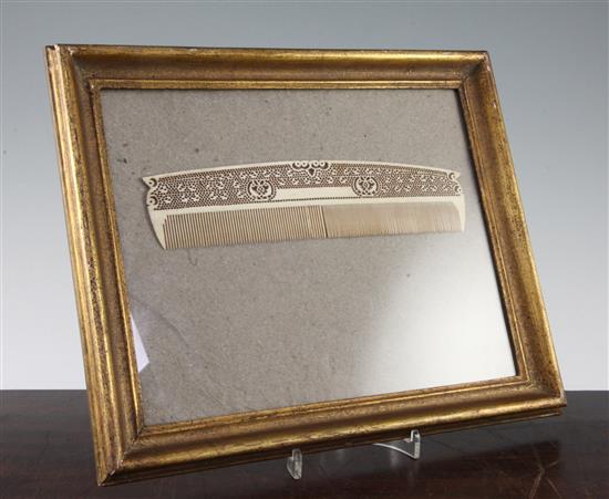A large 19th century carved and pierced ivory comb